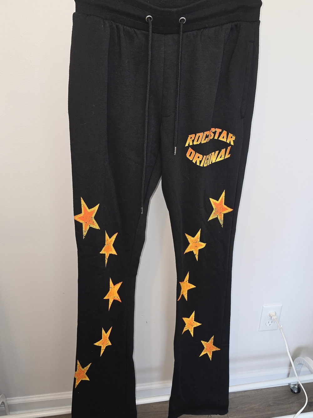 Women's Black Joggers with Orange Star Graphic